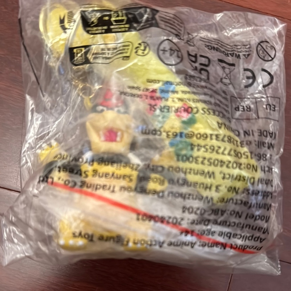 Super Mario Keychain with Yellow and Red Accents